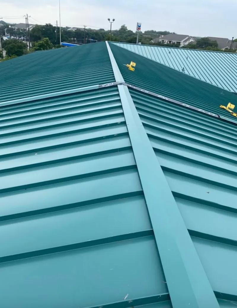 Green commercial metal roof ridge and valley for Metal Roof Repair in Travilah